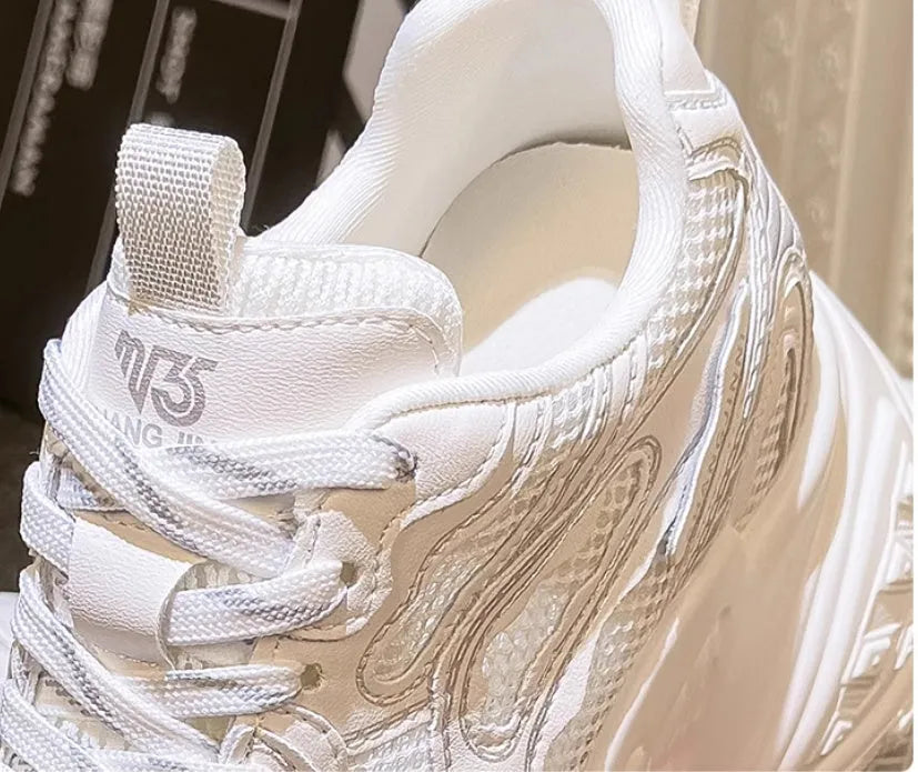 White women's height increasing dad shoes with lace-up closure and round toe, showing internal lift construction
