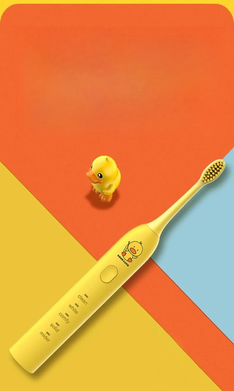 Small yellow duck design electric toothbrush with soft bristles and USB charging port