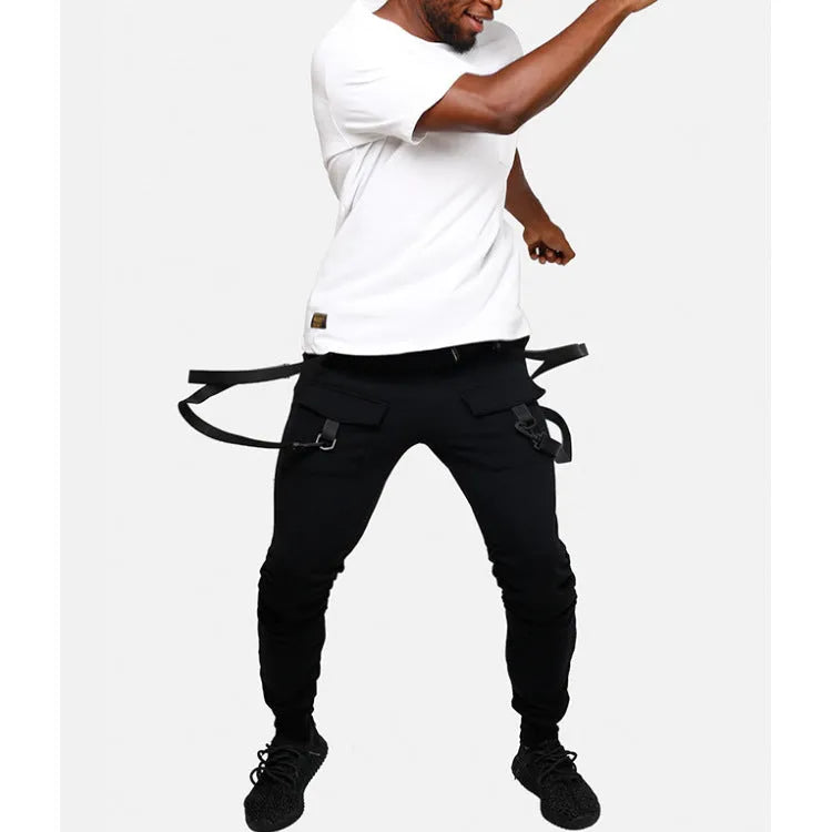 Men's black cotton blend pencil sweatpants with belt, flat lay showing tapered leg and waist elastic