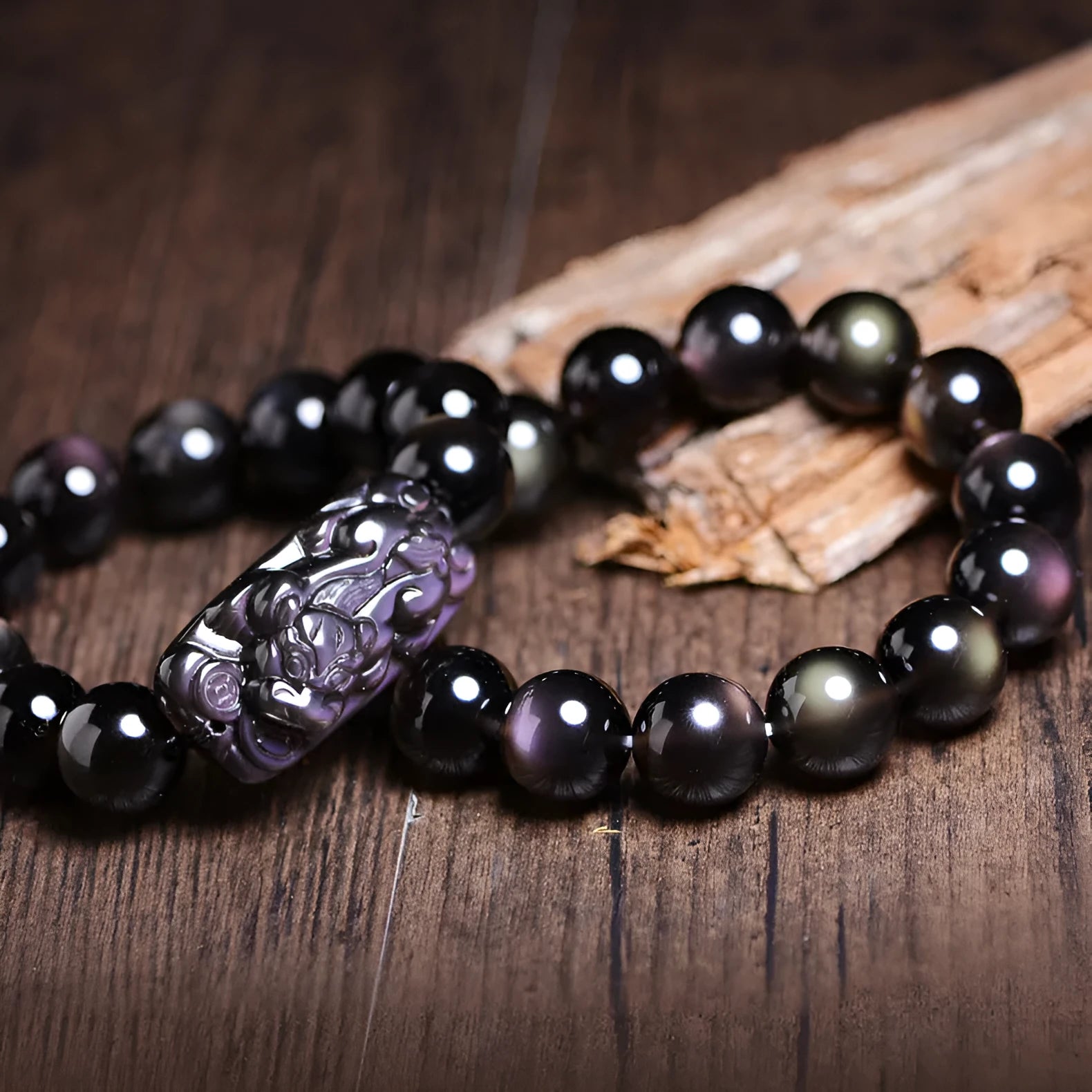 Natural crystal Pi Xiu bracelet with icy obsidian beads in geometric ethnic design