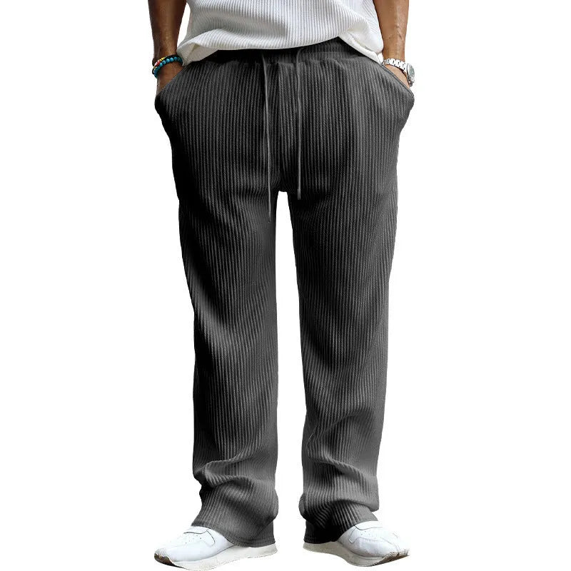 Men's casual loose straight leg trousers in polyester with micro elasticity, shown in army green colour
