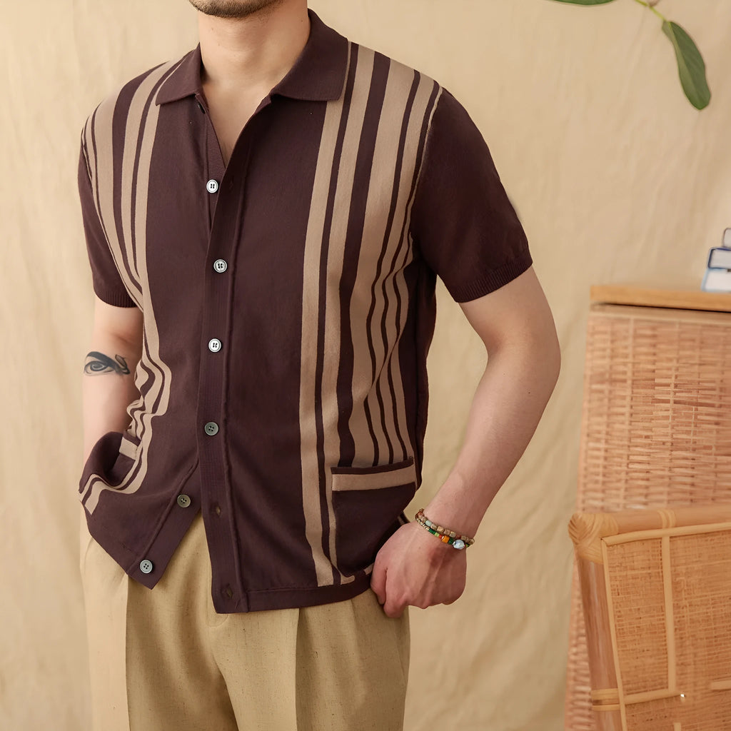 Royal blue striped short-sleeved knitted cardigan polo shirt with a lapel collar laid flat.