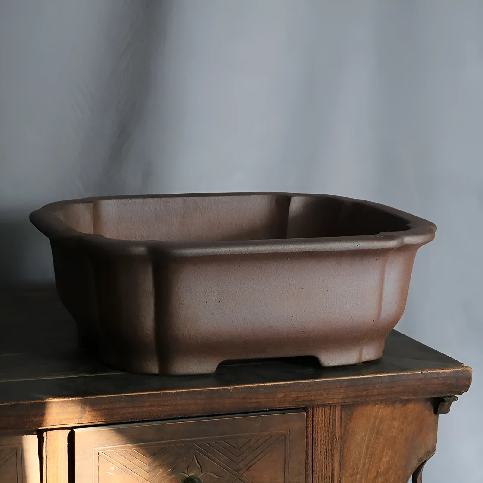 Purple sand rectangular bonsai flower pot with modern simple design on wooden surface