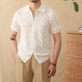 Light brown cotton short sleeve cardigan with zip front and lapel collar laid flat