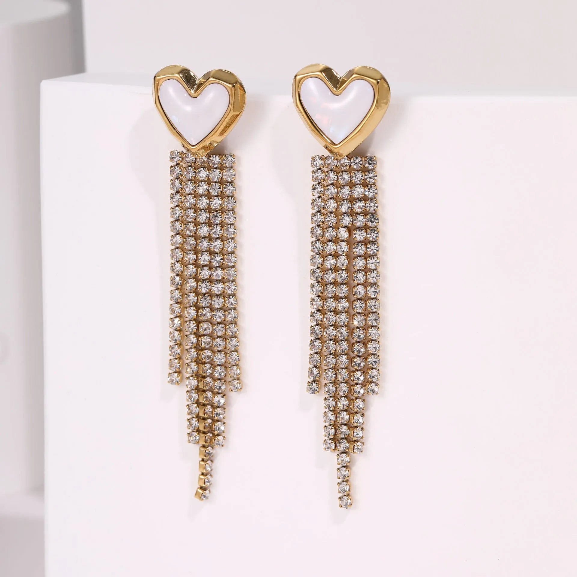 Women's stainless steel earrings with diamond tassel designs in heart, star and geometric shapes with 18K electroplated finish