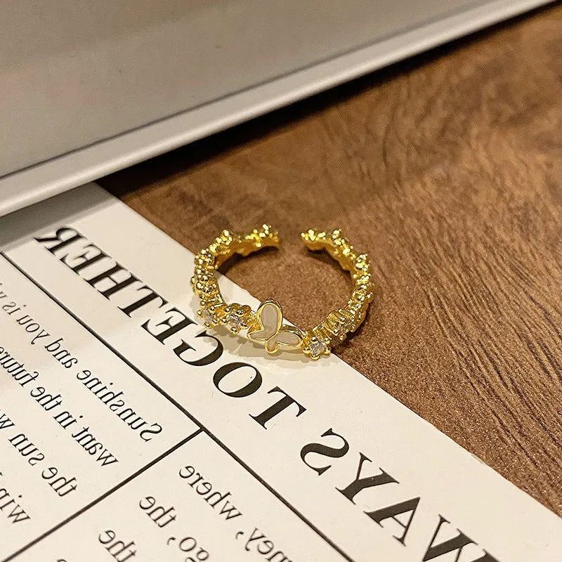 Copper Chinese butterfly women's ring showing creative design with oil dripping treatment finish