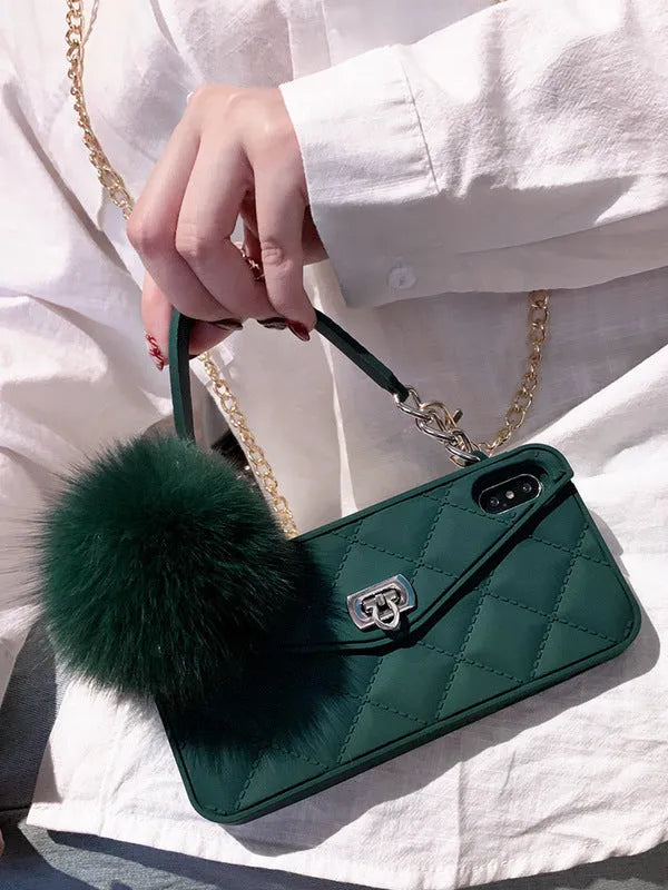 iPhone fluffy hairball plush phone case in dark green grid pattern made from flexible TPU material.