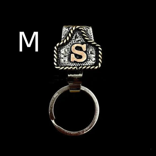 Handmade metal cow tag belt key holder with personalised alphabet letter
