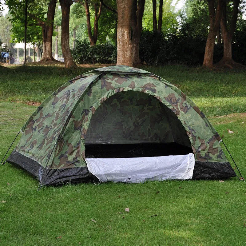 Green camouflage two-person camping tent with mesh windows and steel ground nails