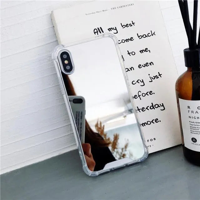 Mirrored back protective TPU case for iPhone on a table