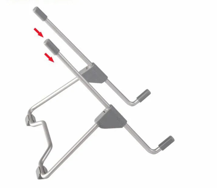 Grey aluminium alloy and plastic stand holding a mobile phone and a laptop on a desk.