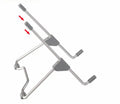 Grey aluminium alloy and plastic stand holding a mobile phone and a laptop on a desk.