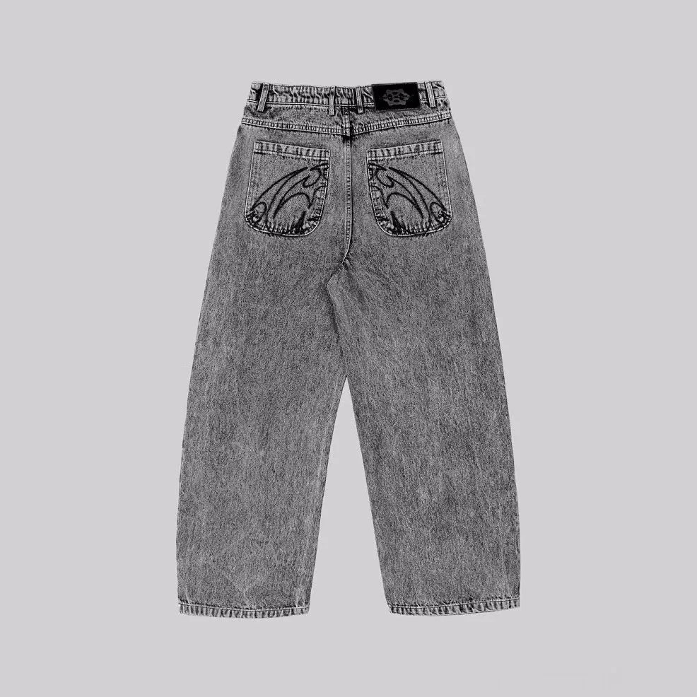 Grey loose straight-leg denim trousers for men and women on hanger