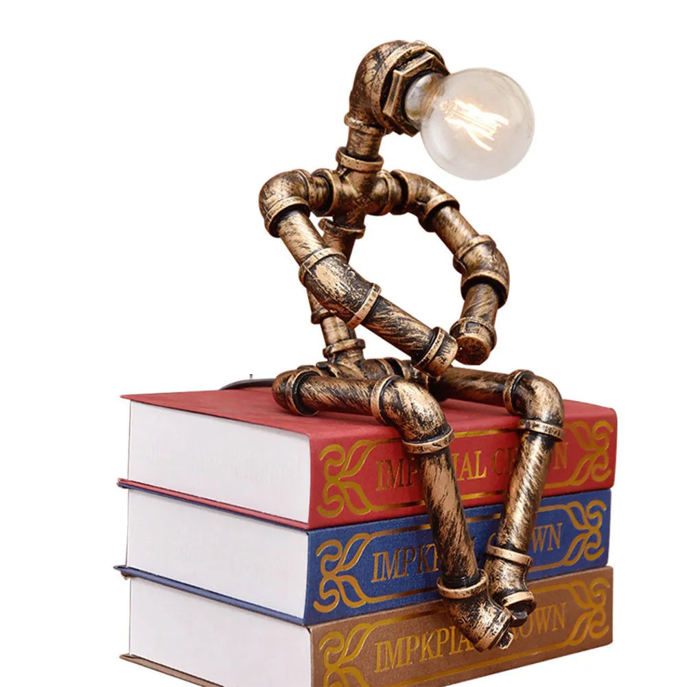 Robot vintage industrial table lamp with iron pipe construction in green bronze finish