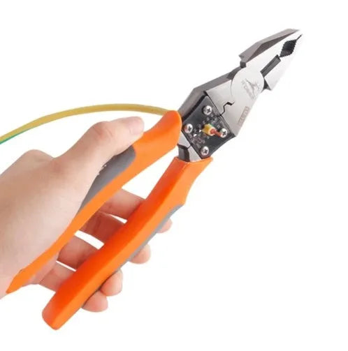 Orange handled multi-function wire cutter pliers with chrome steel jaws on a workbench.