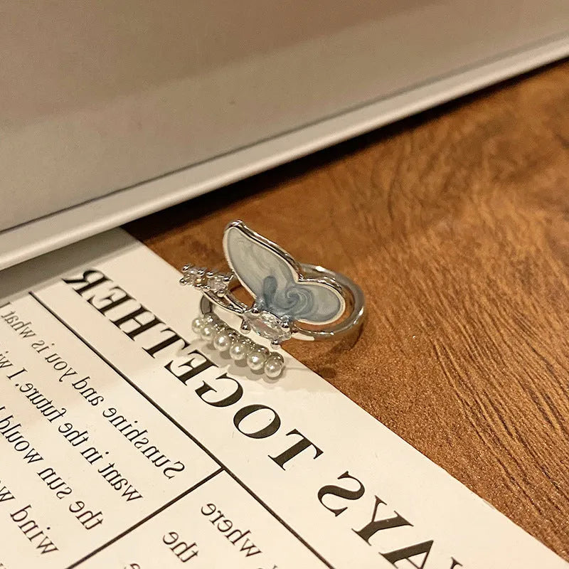Copper Chinese butterfly women's ring showing creative design with oil dripping treatment finish