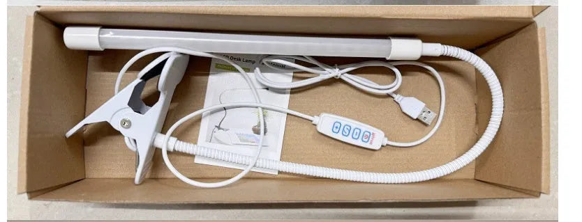 Black and white USB-powered LED desk lamp with 26cm length and eye protection technology