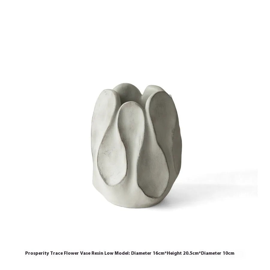 Irregular ceramic art vase in magnesium clay with resin decorative elements for floral arrangements