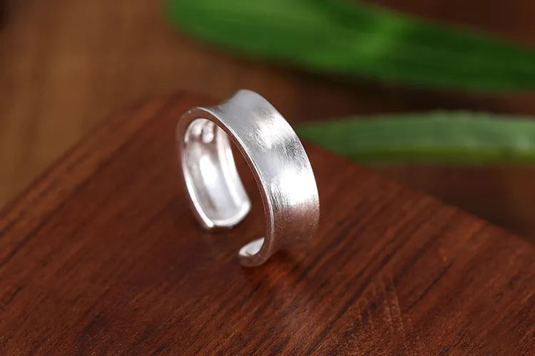 Geometric open sterling silver ring with frosted finish and adjustable opening