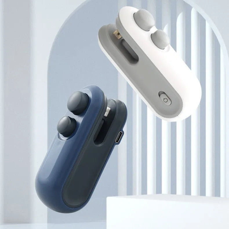 White handheld bag sealer with USB charging port and cutter blade for food storage