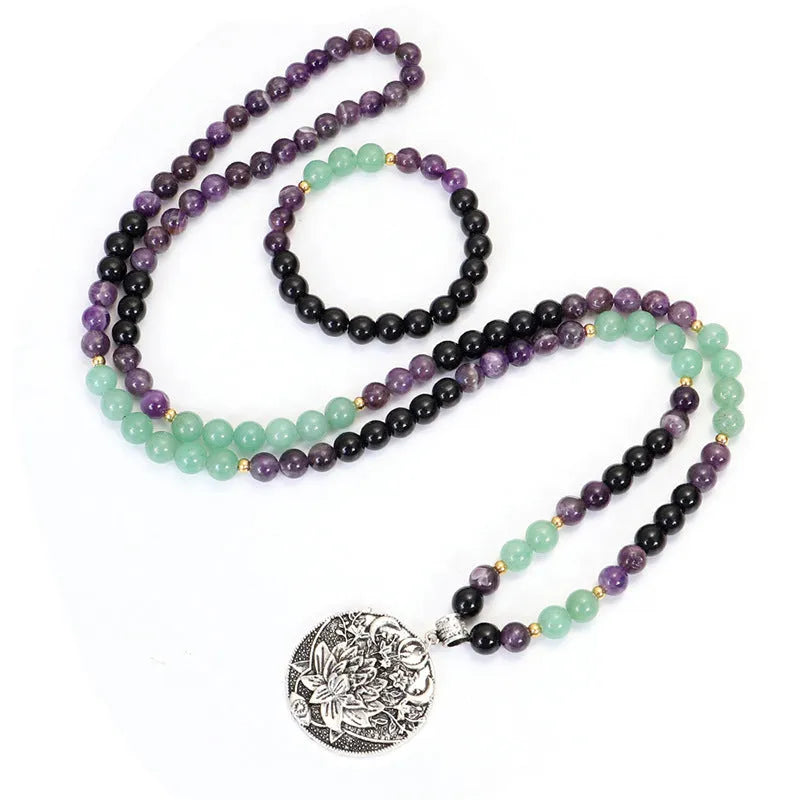 Yoga lotus pendant necklace with handmade stone beads and matching bracelet on adjustable chain.
