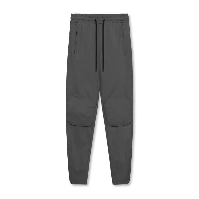 Men's grey ankle-tied fitness trousers with loose casual cut for exercise