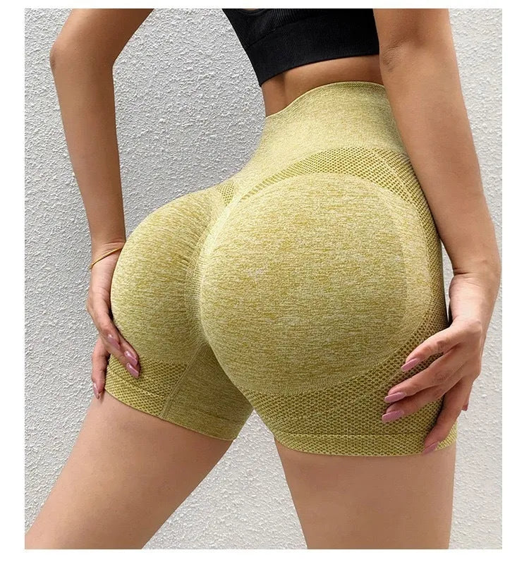 Women's high-waist yoga shorts in quick-dry fabric with seamless waistband for fitness activities