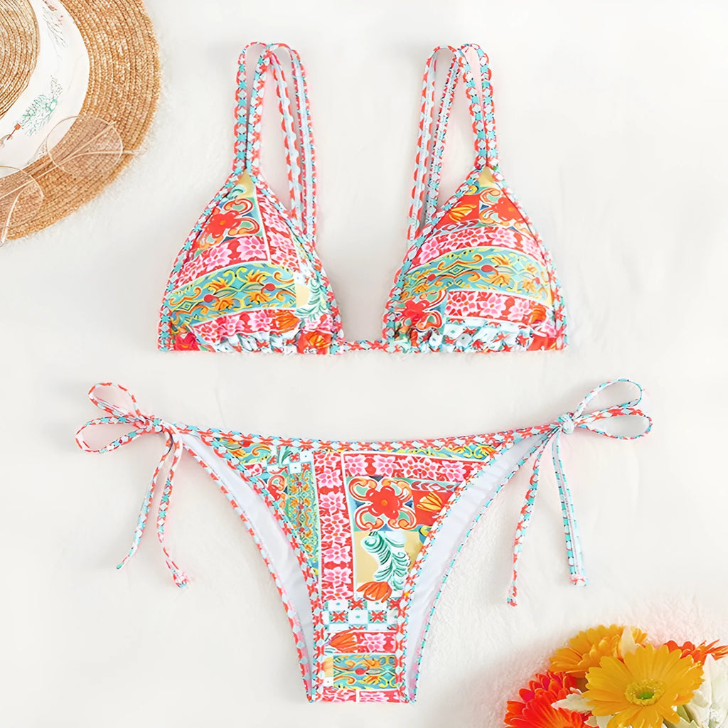 Women's lace-up split swimsuit in picture colour with a backless design and high-cut brief.