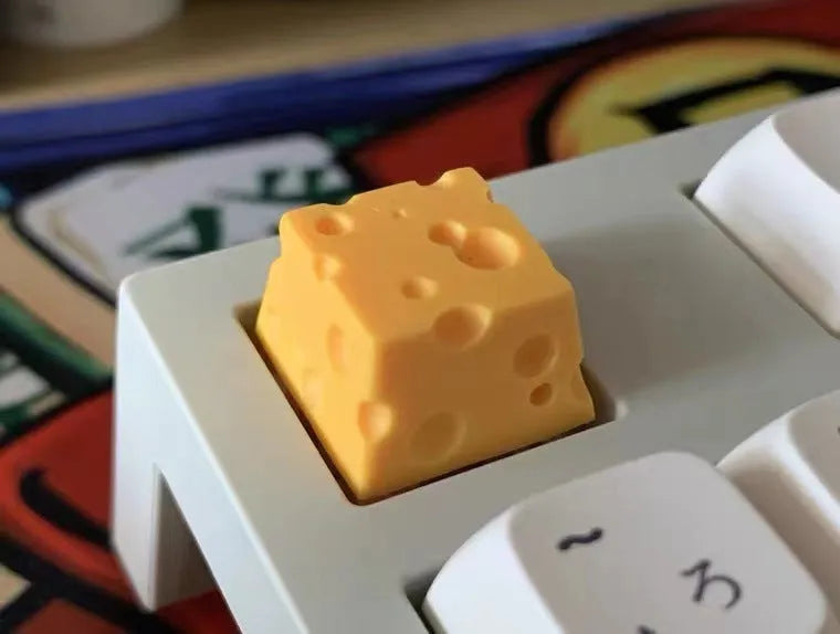Yellow resin cheese wedge key cap for mechanical keyboard customisation with MX stem