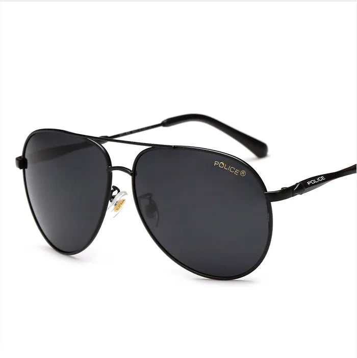 Men's polarised sunglasses with metal frame and black TAC lenses on a reflective surface