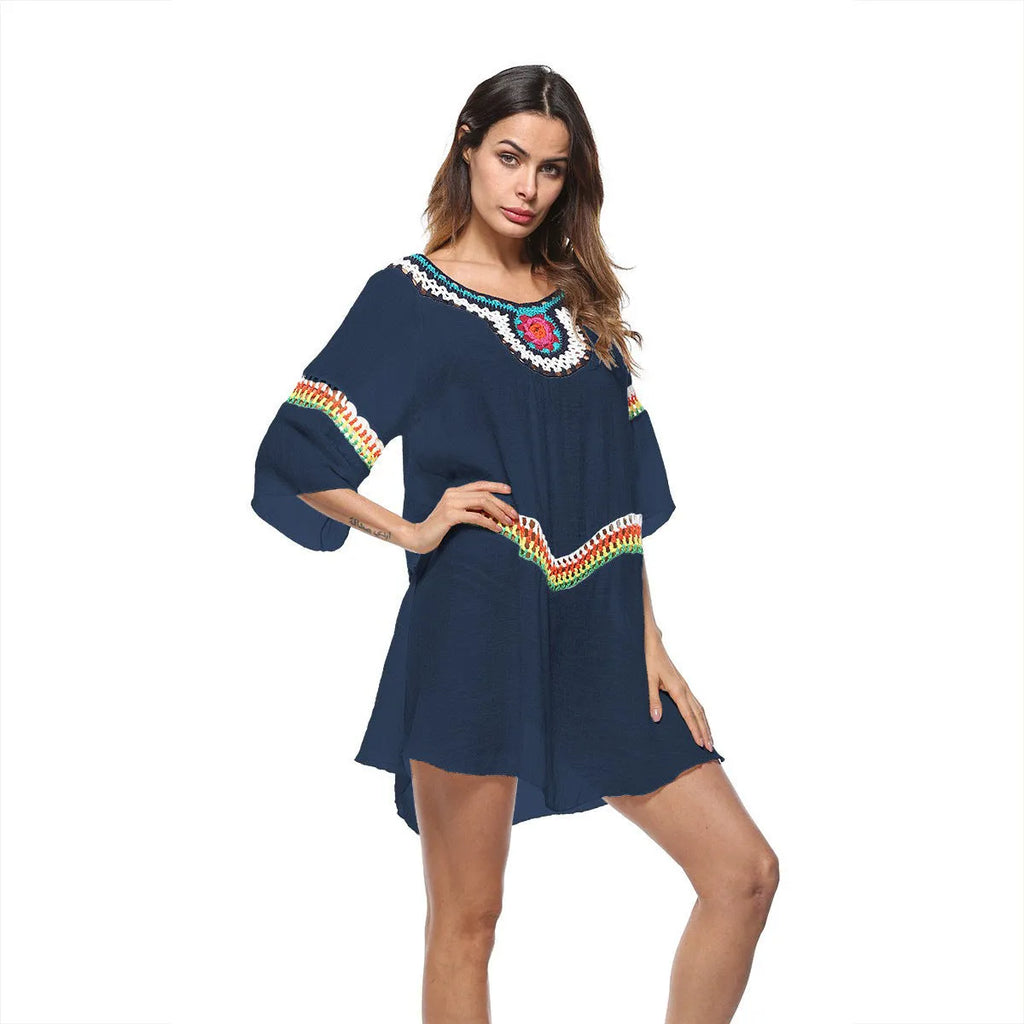 Crocheted white sun protection beach cover-up top for women, loose fit.