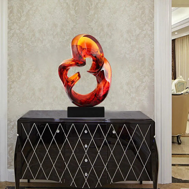 Transparent resin craft ornament in modern style, shown in blue and orange red colour options.