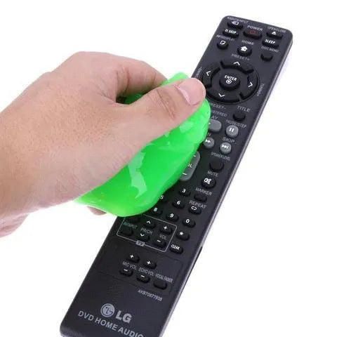 160g boxed blue magic cleaning gel universal cleaning mud on a wooden surface with dust specks