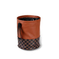 Retractable leather car interior trash can shown in available colour with folding handle design