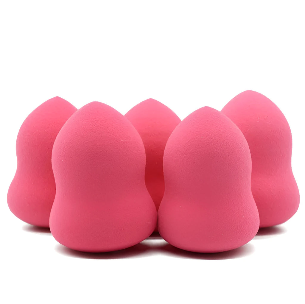 Pink makeup foundation sponge measuring 4cm by 4cm by 5.6cm with soft texture for wet or dry cosmetic application