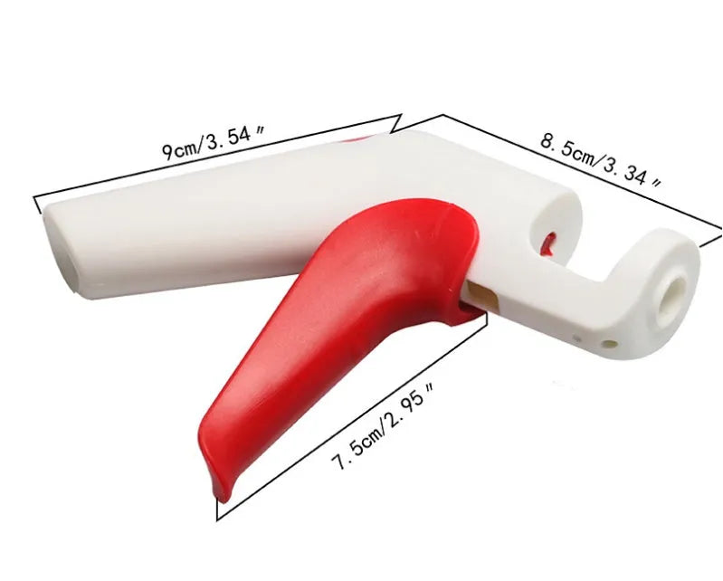 Manual handheld cherry kernel remover kitchen gadget with stainless steel blades and clear pit catcher.