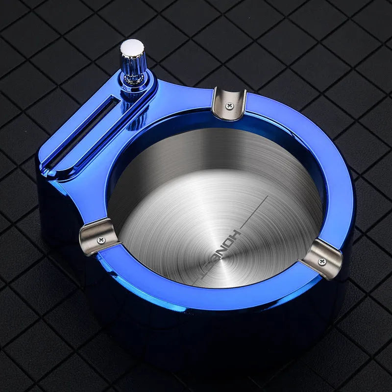 Large stainless steel ashtray with permanent match lighter in blue colour showing cigarette slots