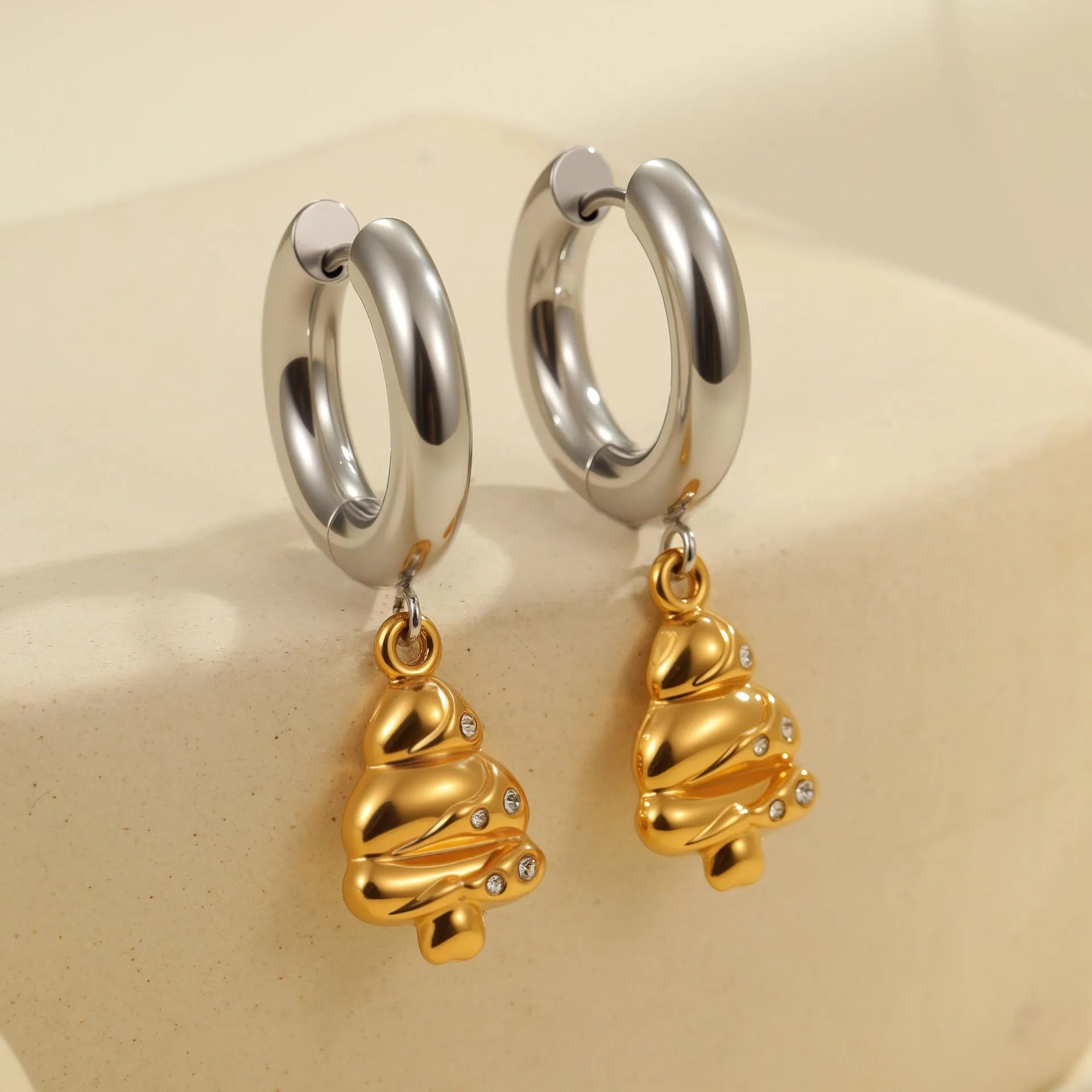 Women's stainless steel earrings with electroplated 18K finish in Christmas tree and heart shapes
