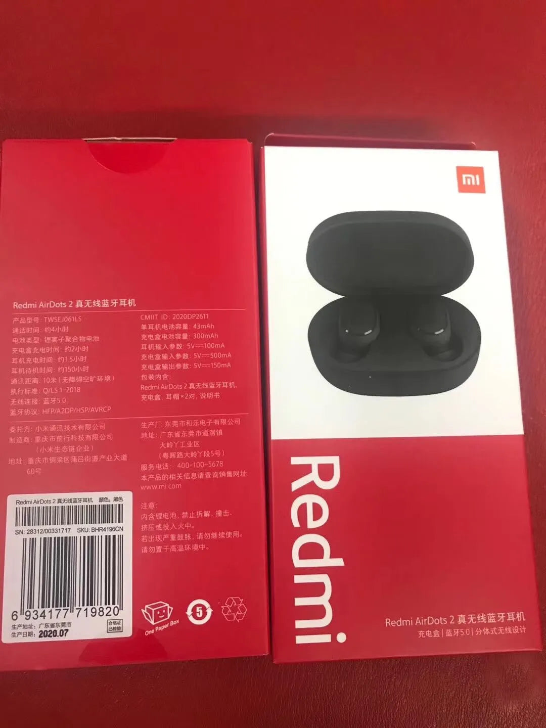 Redmi AirDots 2 Black true wireless earphones with their compact charging case.
