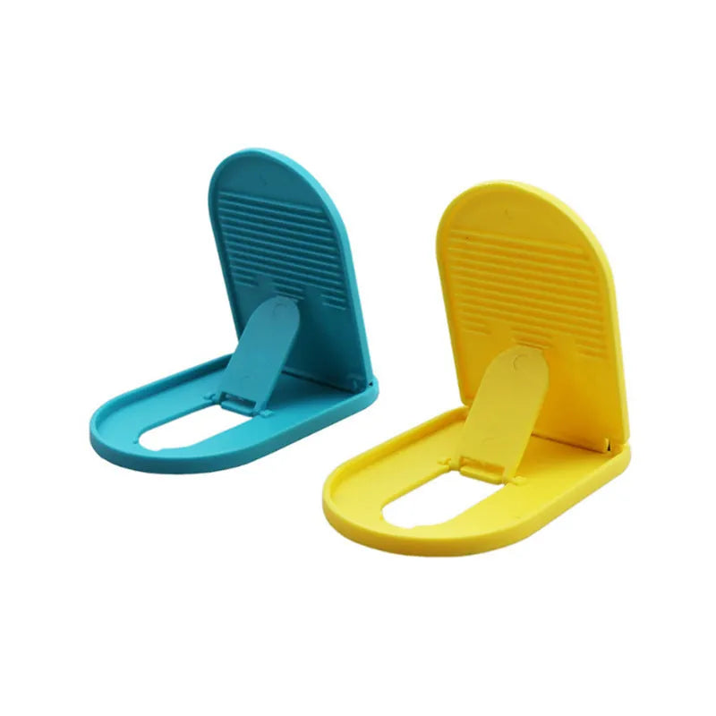 Plastic mobile phone stand with adjustable lazy bracket in six colour options on tabletop