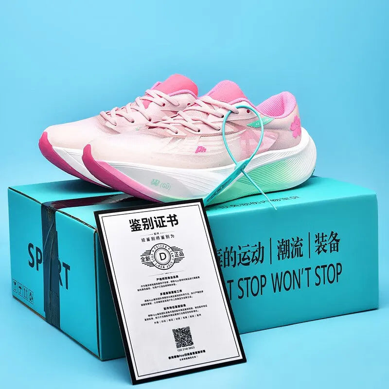Low-top racing sneaker with carbon plate on a natural rubber sole, shown in glacier colour.