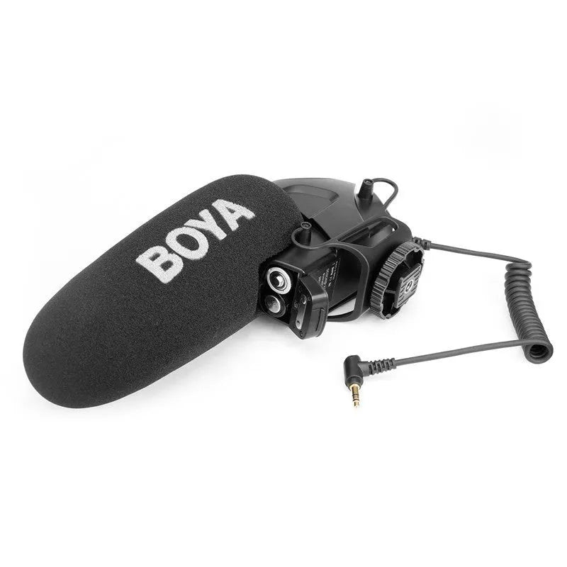 Set top super-heart directional wired microphone with metal grille on desk recording setup
