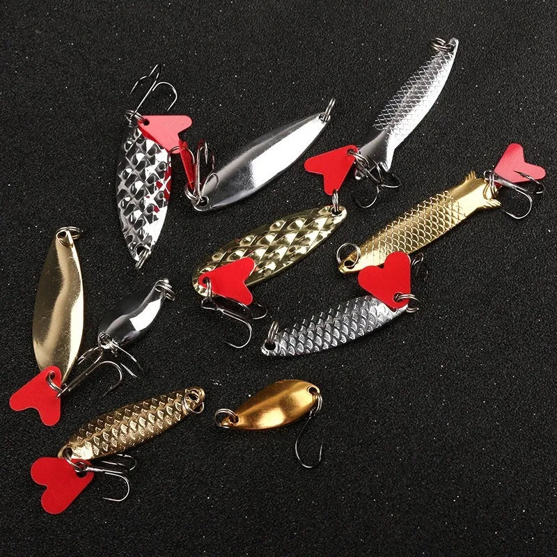 Iron fishing lure with pineapple sequin box design showing gold and silver metallic sequins