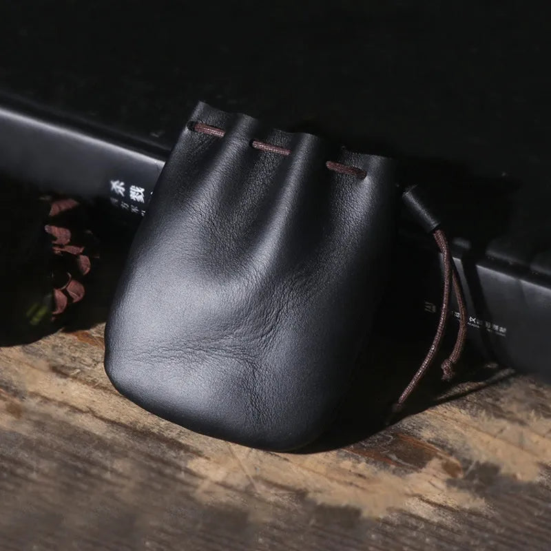 Vintage cowhide drawstring bundle wallet in genuine leather with sewing thread detail