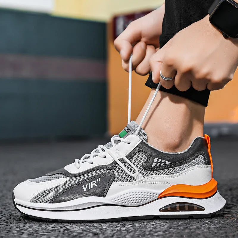 Men's grey and black mesh running shoes with a round toe and lightweight EVA sole on a white background.