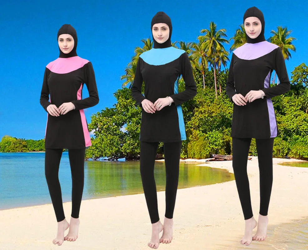 Conservative women's hooded swimsuit with long sleeves in black with rose red colour combination