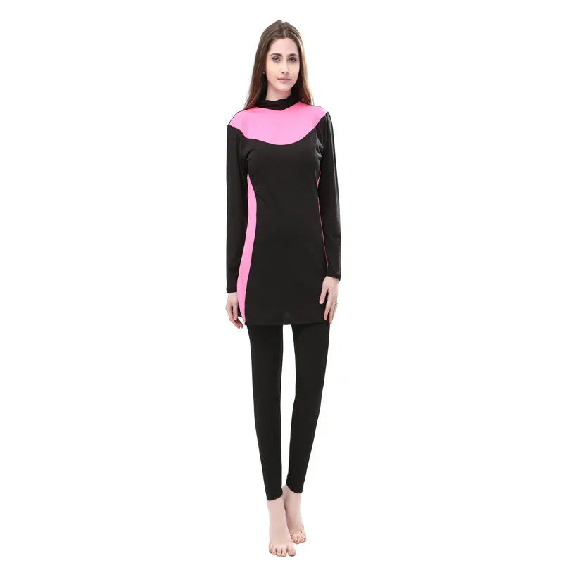 Conservative women's hooded swimsuit with long sleeves in black with rose red colour combination