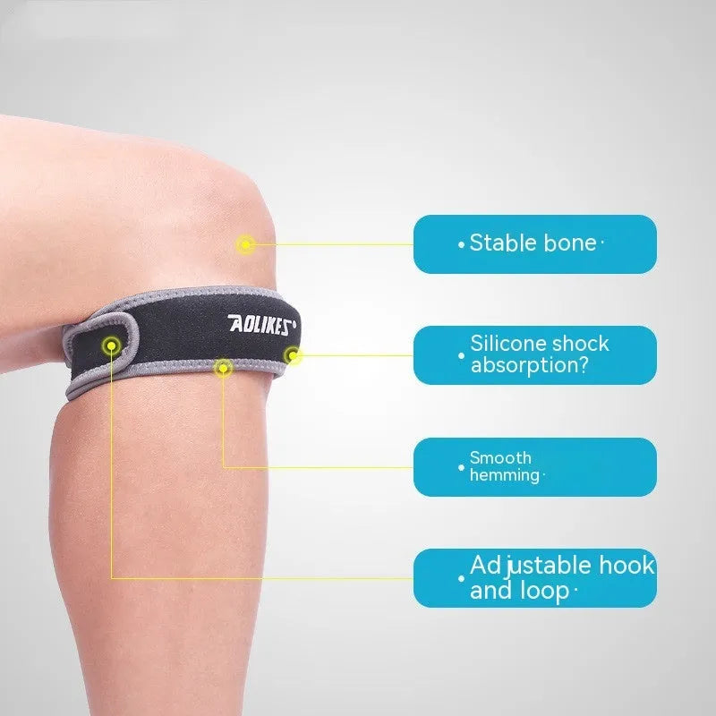 Black and grey elastic patella retinaculum knee support pad for sports.