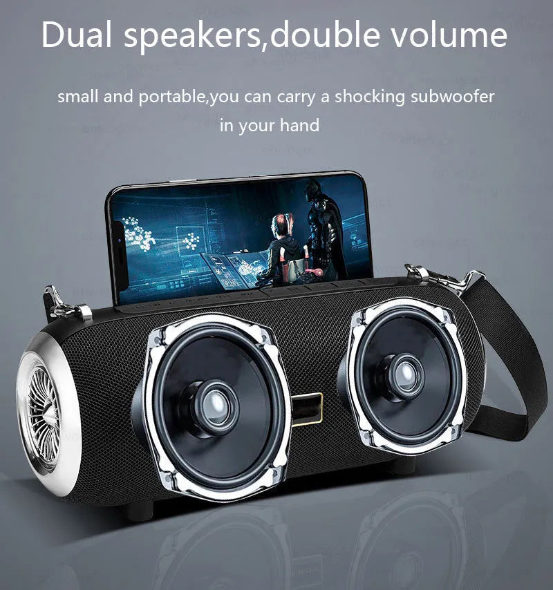 F666 fabric portable Bluetooth speaker with shoulder strap, retractable FM antenna, and mobile phone stand shown in black.