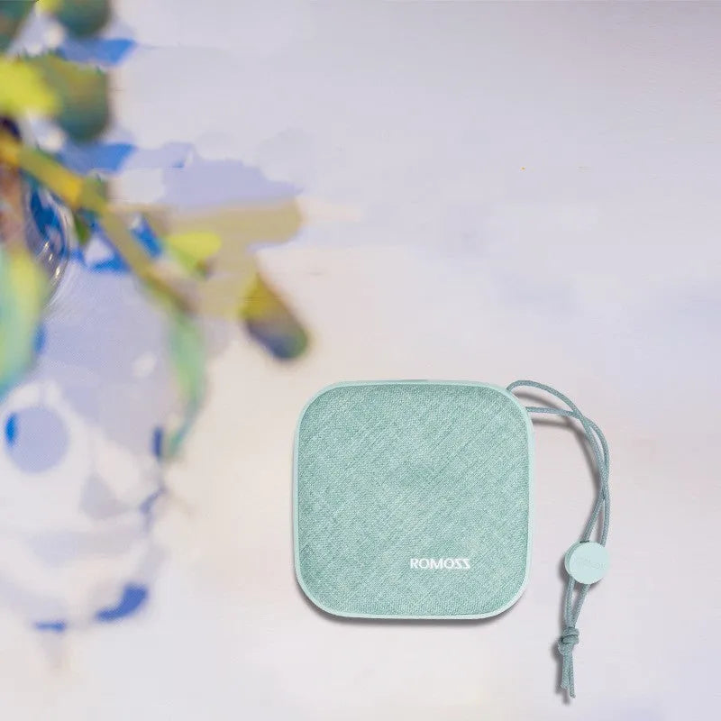 Linen Art mini portable mobile power bank in green with 10000mAh capacity and USB ports